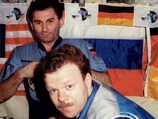 German Astronaut, Reinhold Ewald with Mir-23 commander Vasily Tsibliev in the background, in Mir's Base Block. 